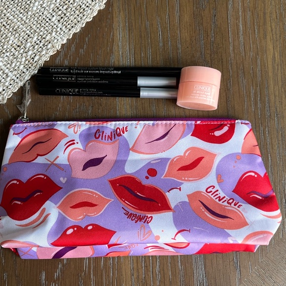 Clinique Other - Pretty Easy Clinique liquid eyeliner high impact Black All About Eyes Makeup Bag